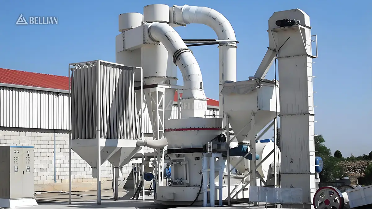 Side view of HGM130 main mill and connected dust collection pipeline installed at Vietnam customer’s factory outdoor station